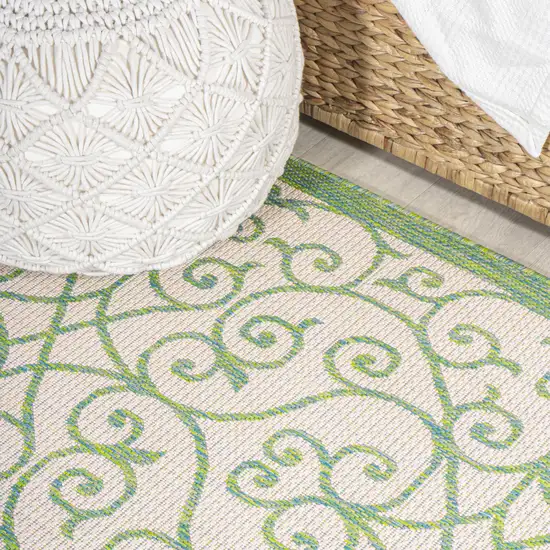 8' Cream And Green Geometric Indoor Outdoor Runner Rug Photo 7