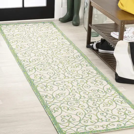 8' Cream And Green Geometric Indoor Outdoor Runner Rug Photo 4
