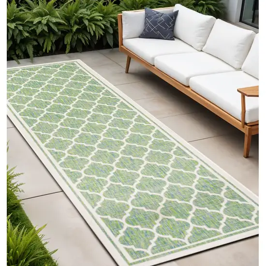 10' Cream And Green Geometric Indoor Outdoor Runner Rug Photo 1