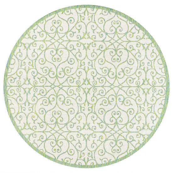5' Cream And Green Round Geometric Indoor Outdoor Area Rug Photo 1