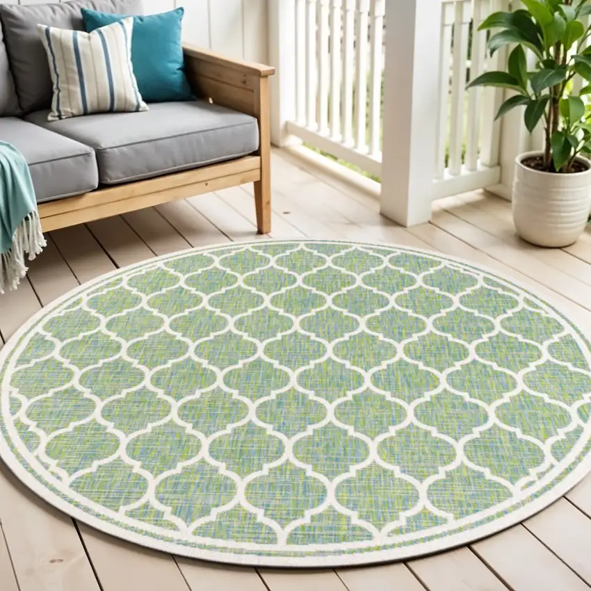 5' Cream And Green Round Geometric Indoor Outdoor Area Rug Photo 1