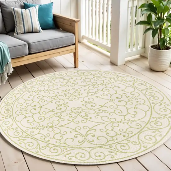5' Cream And Green Round Medallion Indoor Outdoor Area Rug Photo 1