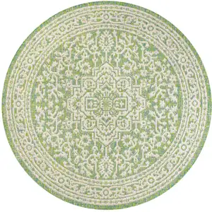 Photo of 5' Cream And Green Round Medallion Indoor Outdoor Area Rug