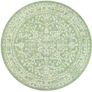 Photo of 5' Cream And Green Round Medallion Indoor Outdoor Area Rug