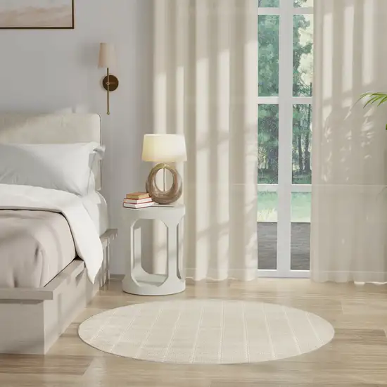 4' Cream And Ivory Geometric Round Rug Photo 7