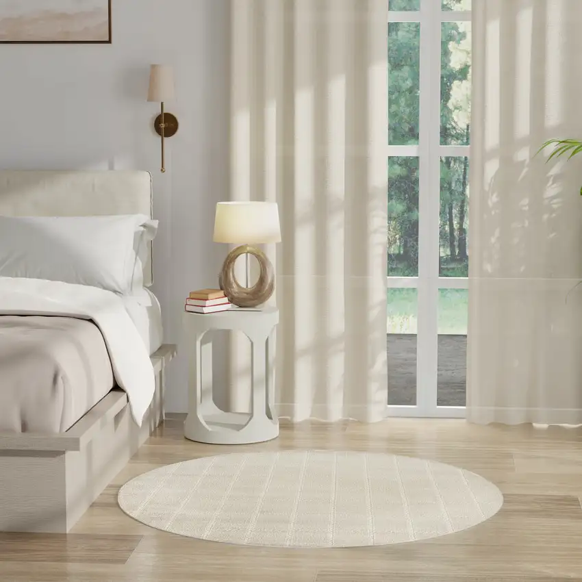 4' Cream And Ivory Geometric Round Rug Photo 7