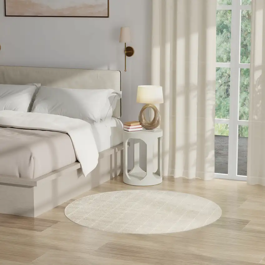 4' Cream And Ivory Geometric Round Rug Photo 5