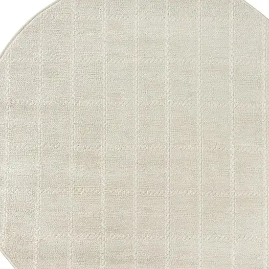 4' Cream And Ivory Geometric Round Rug Photo 4