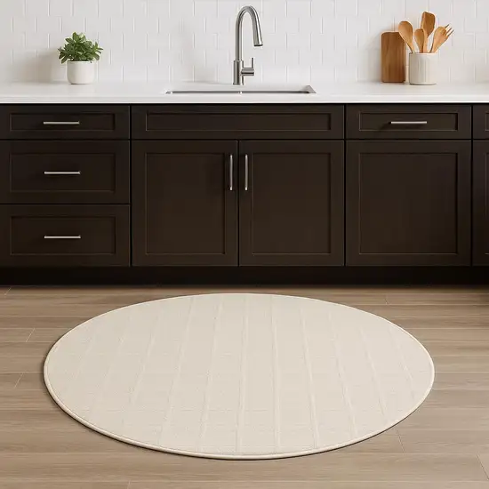 4' Cream And Ivory Geometric Round Rug Photo 1