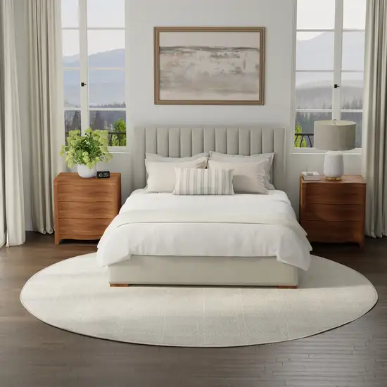 8' Cream And Ivory Geometric Round Rug Photo 7