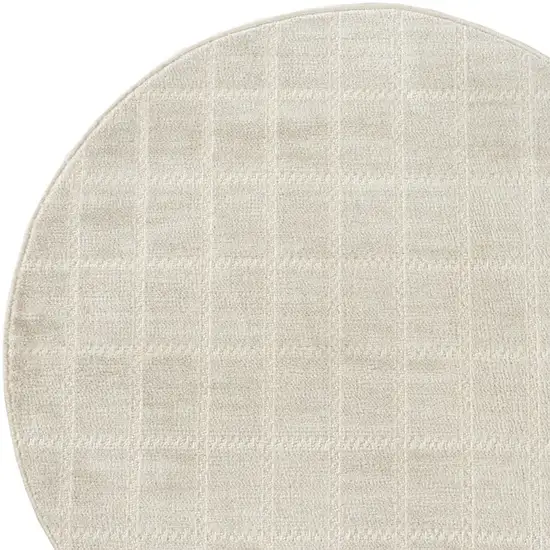 8' Cream And Ivory Geometric Round Rug Photo 8