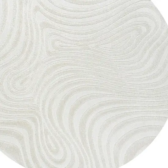 5' Cream And Ivory Round Abstract Indoor Outdoor Area Rug Photo 2