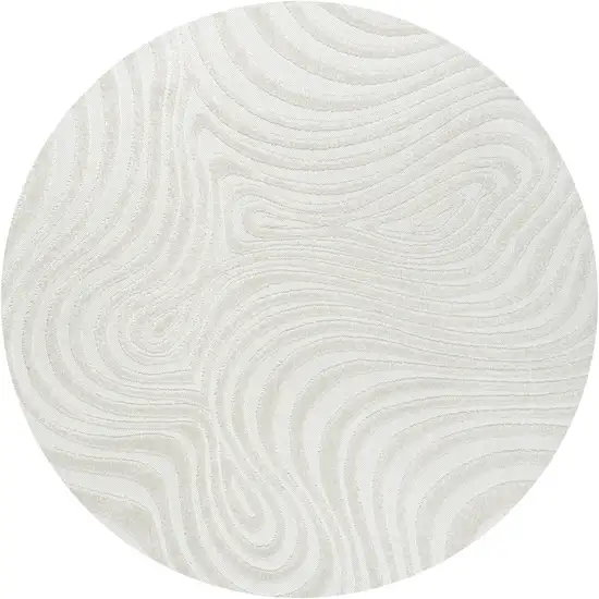 7' Cream And Ivory Round Abstract Indoor Outdoor Area Rug Photo 1