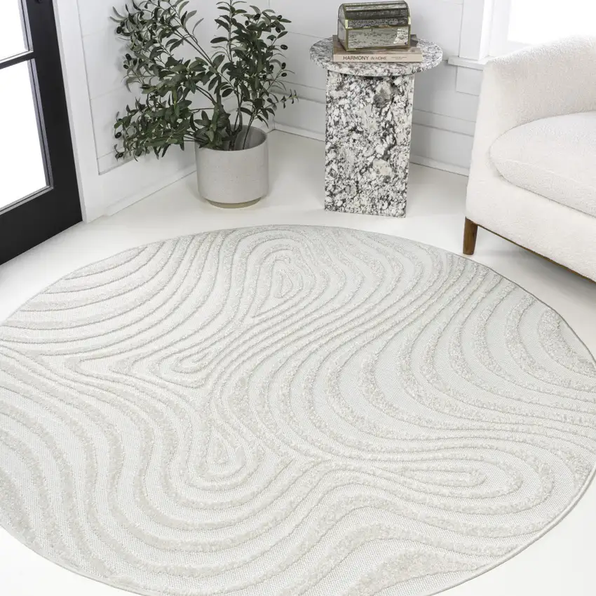 9' Cream And Ivory Round Abstract Indoor Outdoor Area Rug Photo 4