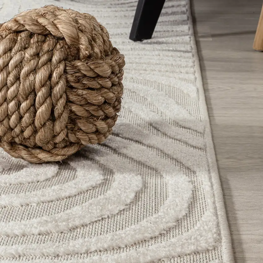 9' Cream And Ivory Round Abstract Indoor Outdoor Area Rug Photo 9