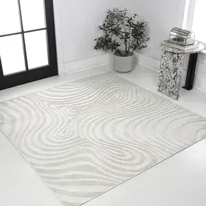 Photo of 5' Cream And Ivory Square Abstract Indoor Outdoor Area Rug