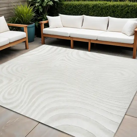 7' Cream And Ivory Square Abstract Indoor Outdoor Area Rug Photo 1