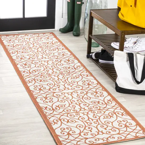 8' Cream And Orange Geometric Indoor Outdoor Runner Rug Photo 4