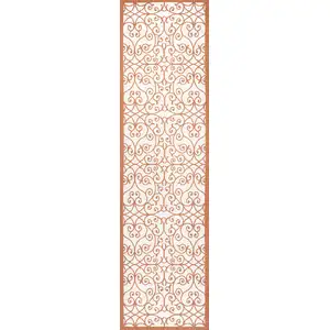 Photo of 8' Cream And Orange Geometric Indoor Outdoor Runner Rug