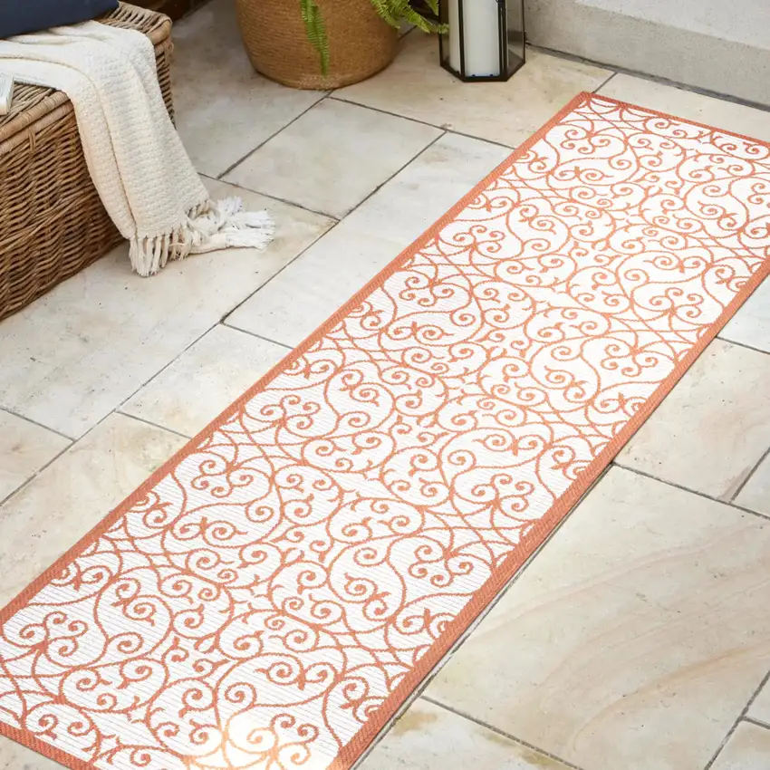 8' Cream And Orange Geometric Indoor Outdoor Runner Rug Photo 5