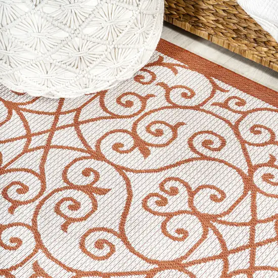 5' Cream And Orange Round Geometric Indoor Outdoor Area Rug Photo 8