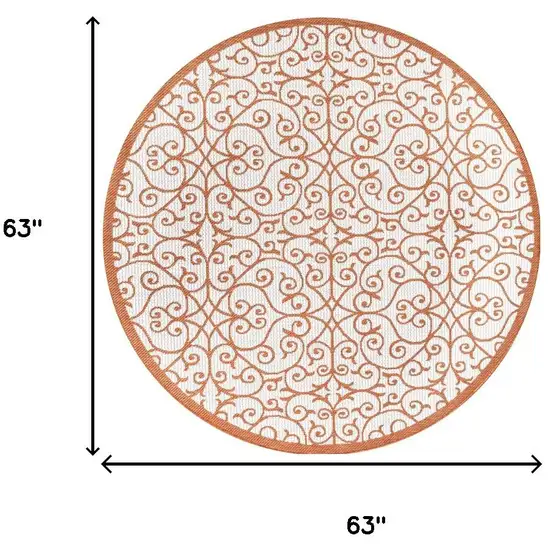 5' Cream And Orange Round Geometric Indoor Outdoor Area Rug Photo 9