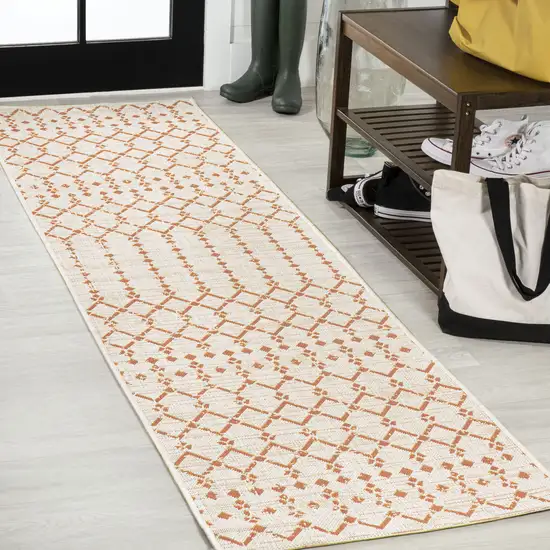10' Cream And Orange Trellis Indoor Outdoor Runner Rug Photo 4