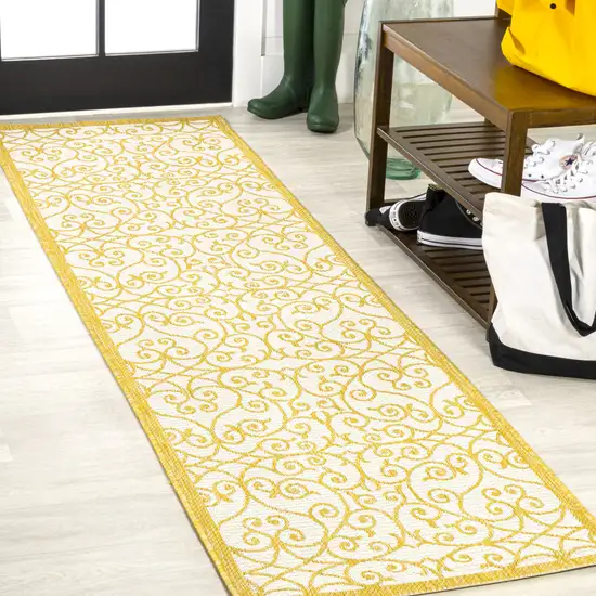10' Cream And Yellow Geometric Indoor Outdoor Runner Rug Photo 2
