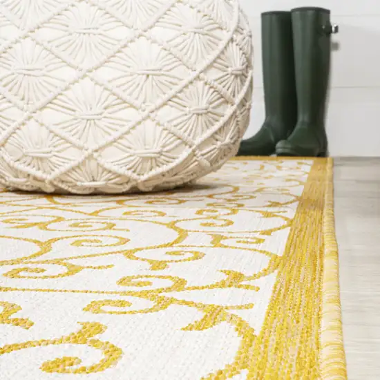 8' Cream And Yellow Geometric Indoor Outdoor Runner Rug Photo 9