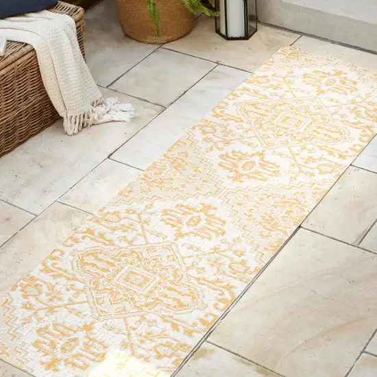10' Cream And Yellow Medallion Indoor Outdoor Runner Rug Photo 5