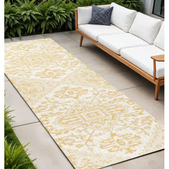 10' Cream And Yellow Medallion Indoor Outdoor Runner Rug Photo 1
