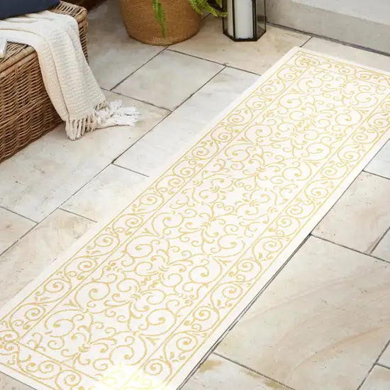 8' Cream And Yellow Medallion Indoor Outdoor Runner Rug Photo 5