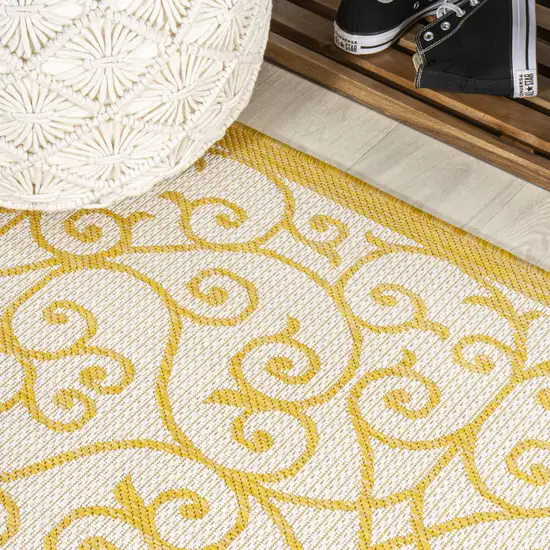 5' Cream And Yellow Round Geometric Indoor Outdoor Area Rug Photo 5