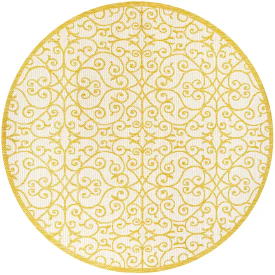 5' Cream And Yellow Round Geometric Indoor Outdoor Area Rug Photo 1