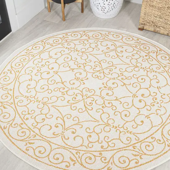 5' Cream And Yellow Round Medallion Indoor Outdoor Area Rug Photo 4