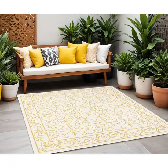 5' Cream And Yellow Square Medallion Indoor Outdoor Area Rug Photo 1