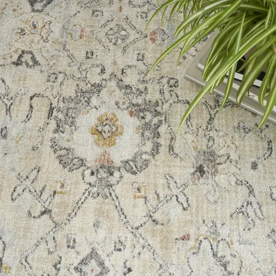 8' Cream Black And Yellow Floral Distressed Round Rug Photo 9
