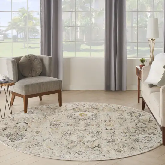 8' Cream Black And Yellow Floral Distressed Round Rug Photo 4