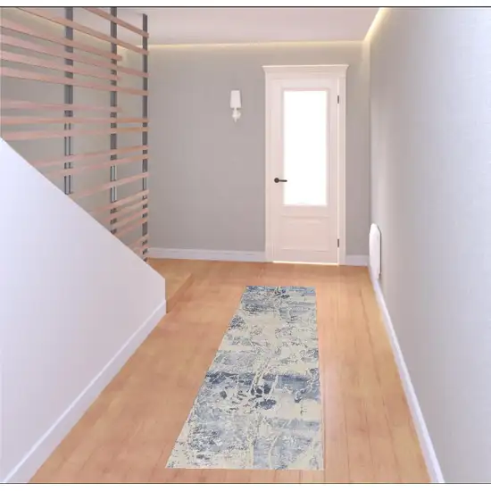 8' Cream Blue And Light Blue Abstract Non Skid Runner Rug Photo 1