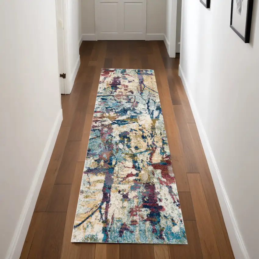 8' Cream Blue and Green Abstract Distressed Runner Rug Photo 1