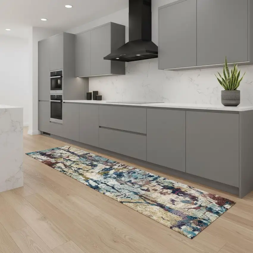 8' Cream Blue and Green Abstract Distressed Runner Rug Photo 1