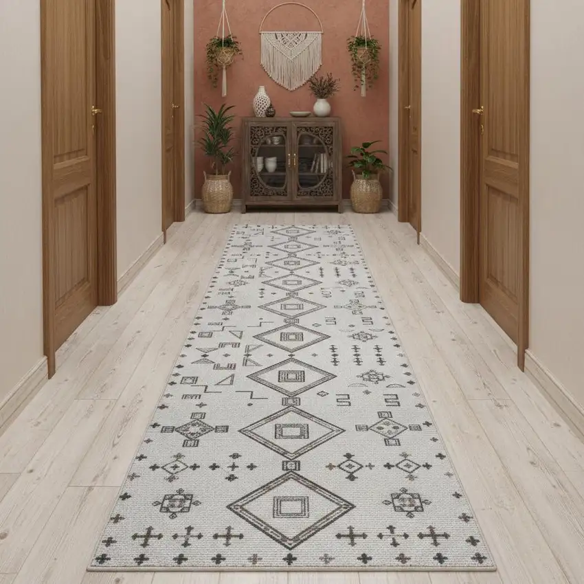 10' Cream Geometric Distressed Washable Runner Rug Photo 1