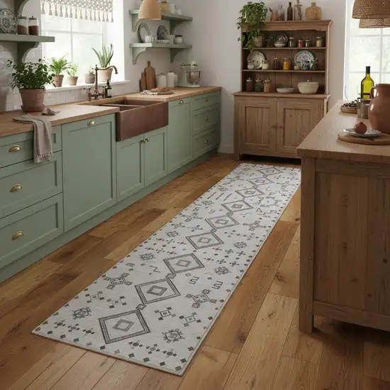 8' Cream Geometric Distressed Washable Runner Rug Photo 1