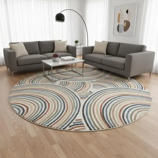 8' Cream Round Abstract Power Loom Area Rug Photo 1