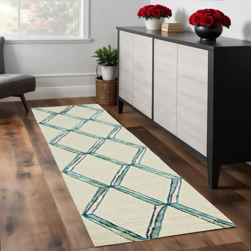 8' Cream And Aqua Wool Geometric Hand Tufted Runner Rug Photo 1