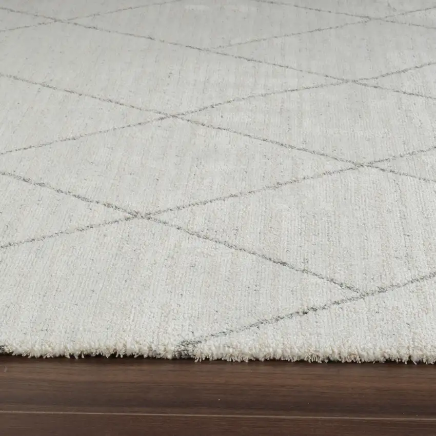 8' Cream and Beige Abstract Distressed Area Rug Photo 8