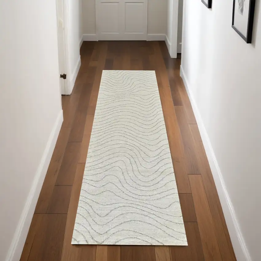 8' Cream and Beige Abstract Non Skid Runner Rug Photo 1