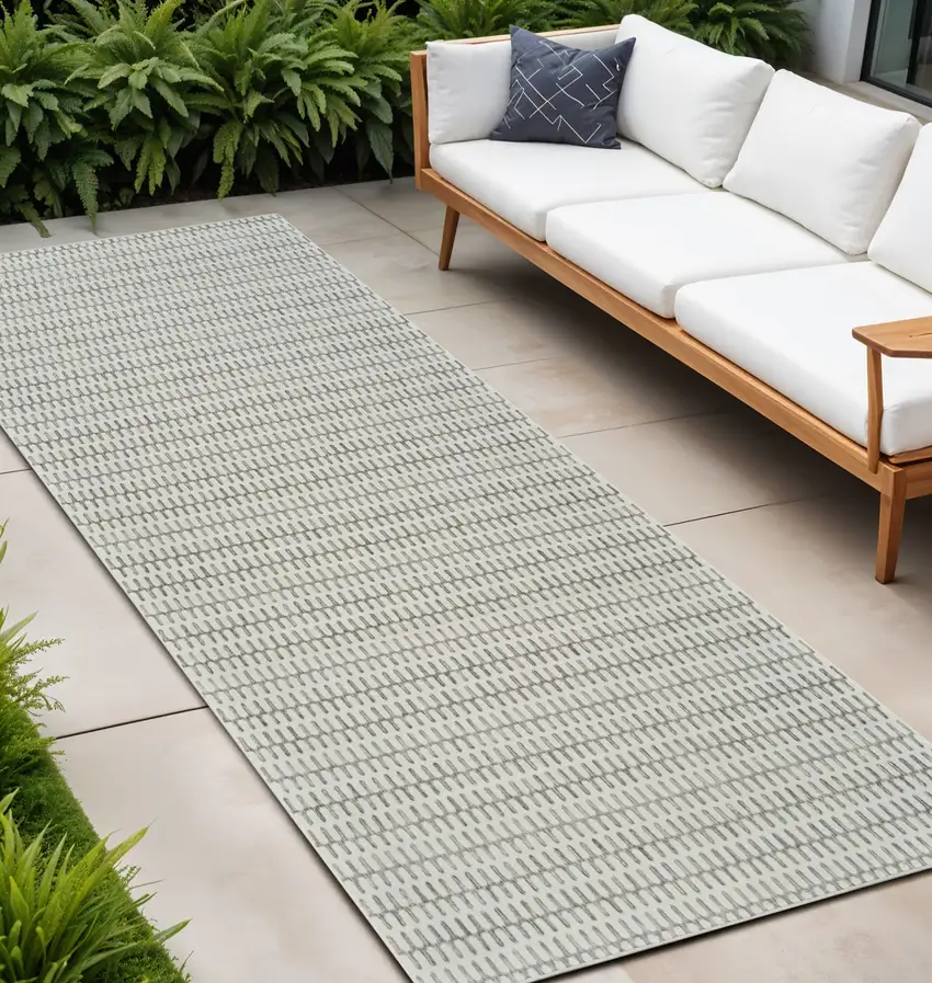 10' Cream and Beige Geometric Distressed Indoor Outdoor Runner Rug Photo 1