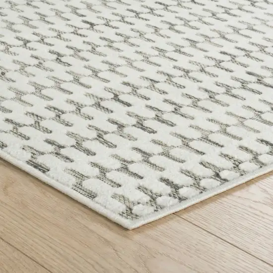 10' Cream and Beige Geometric Distressed Indoor Outdoor Runner Rug Photo 3