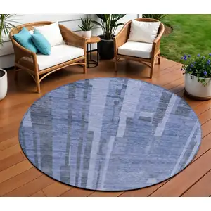 Photo of 8' Denim Blue And Charcoal Round Striped Washable Indoor Outdoor Area Rug